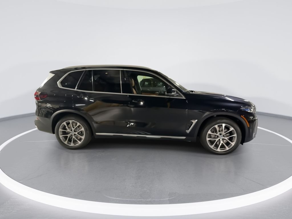 New 2026 Black Sapphire Metallic BMW xDrive50e image 9