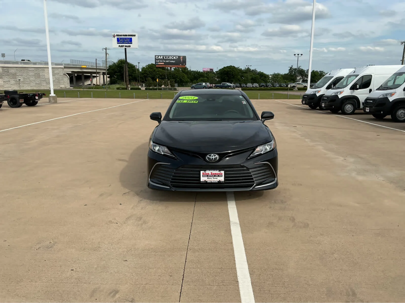 Used 2023 Midnight Black Metallic Toyota LE image 3