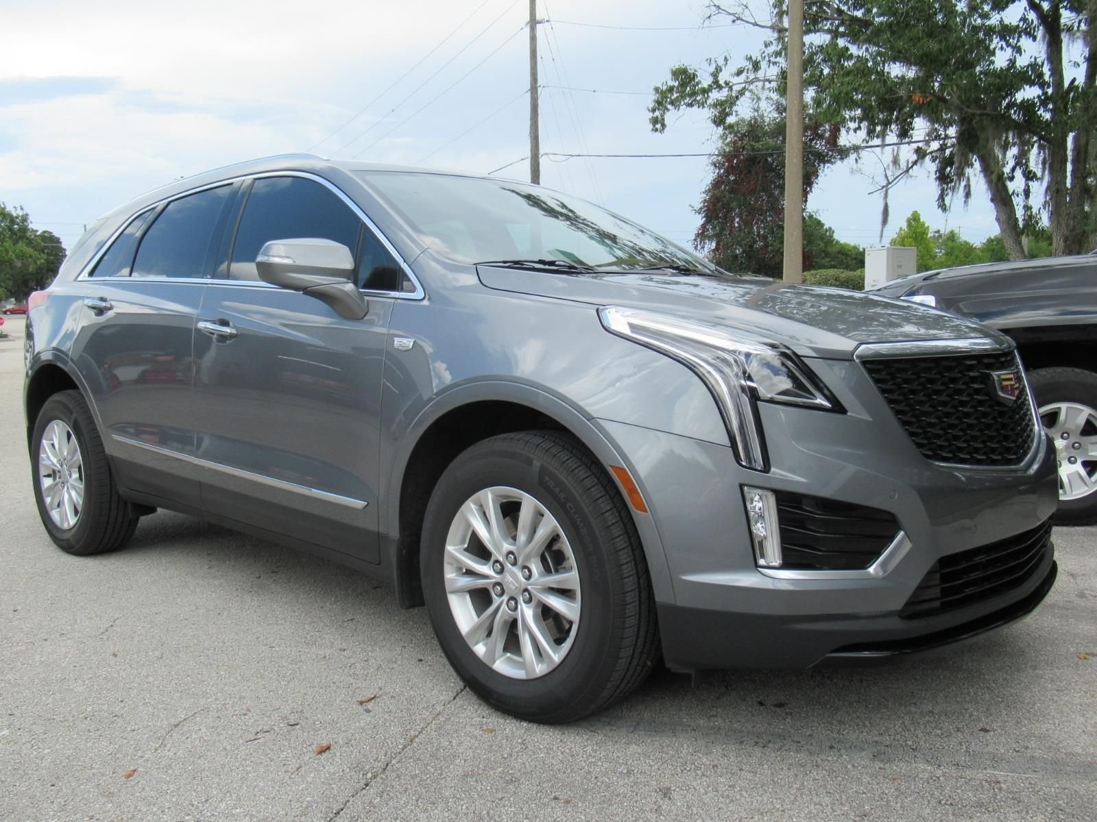 Used 2022 Gray Cadillac Luxury image 1