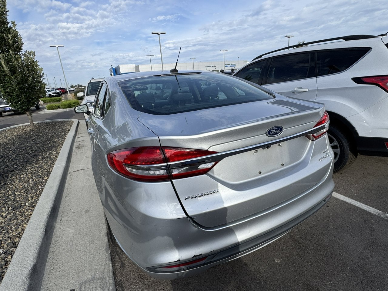 Used 2017 Ingot Silver Ford Hybrid SE image 4