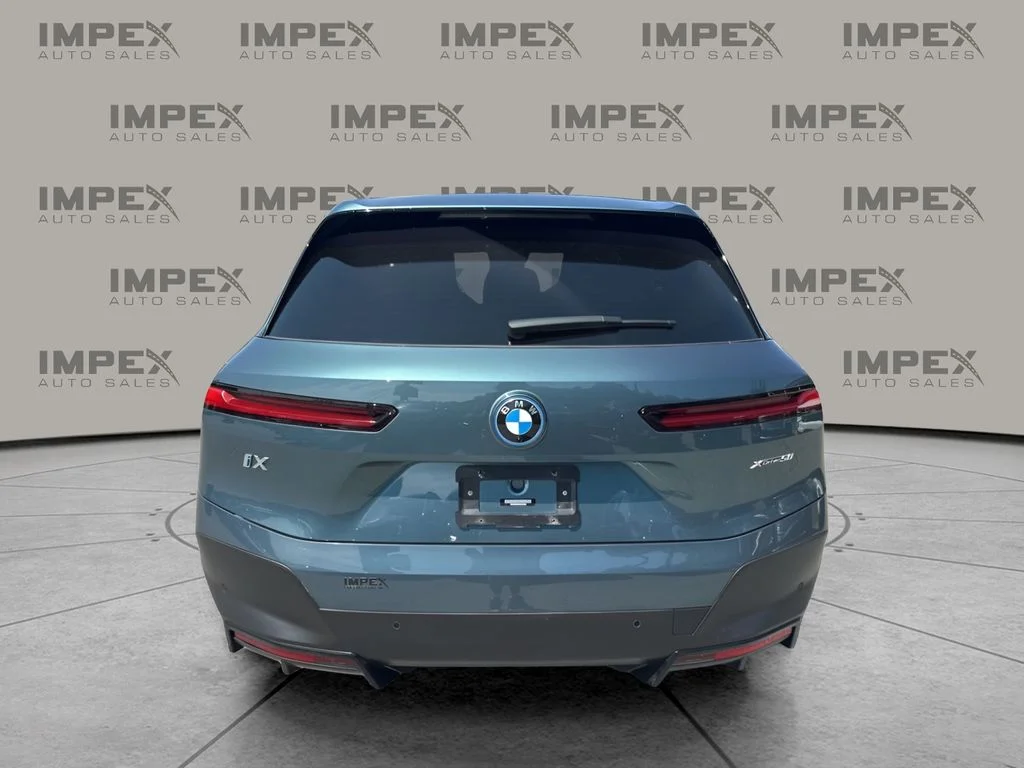 Used 2023 Blue BMW xDrive50 image 4