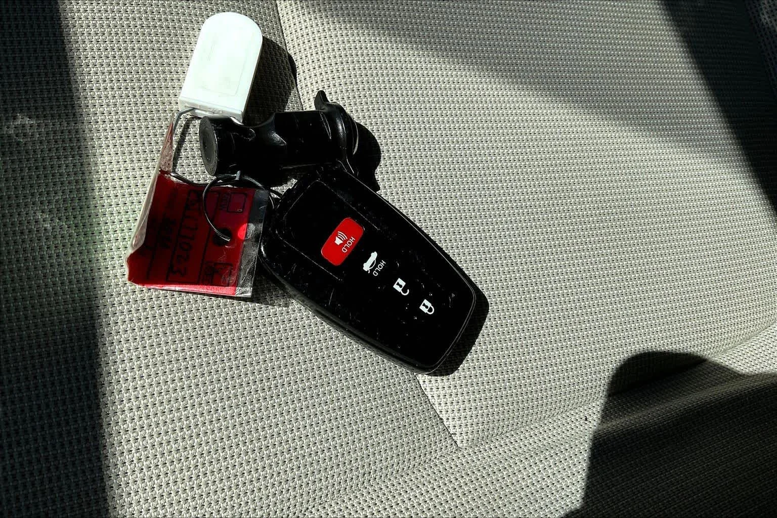 Used 2021 Super White Toyota LE image 14