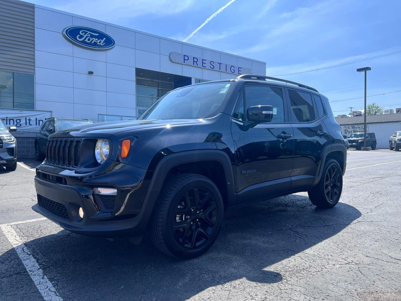 Used 2023 Black Clearcoat Jeep Altitude image 4