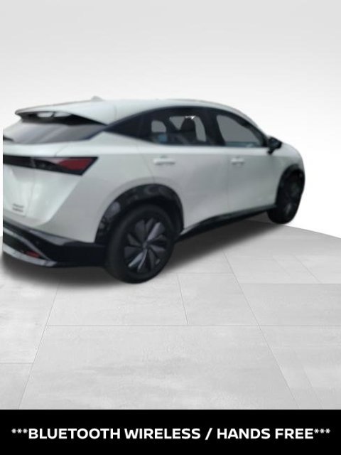 Certified Used 2024 White Nissan EVOLVE+ e-4ORCE image 3