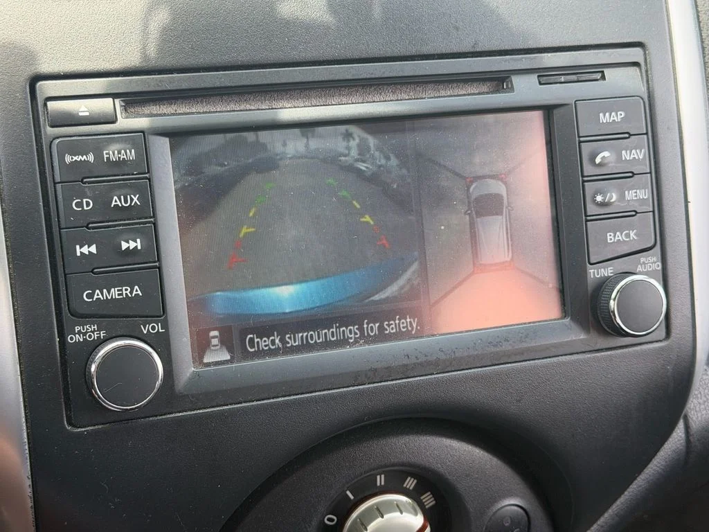Used 2014 Metallic Peacock Nissan SV image 22