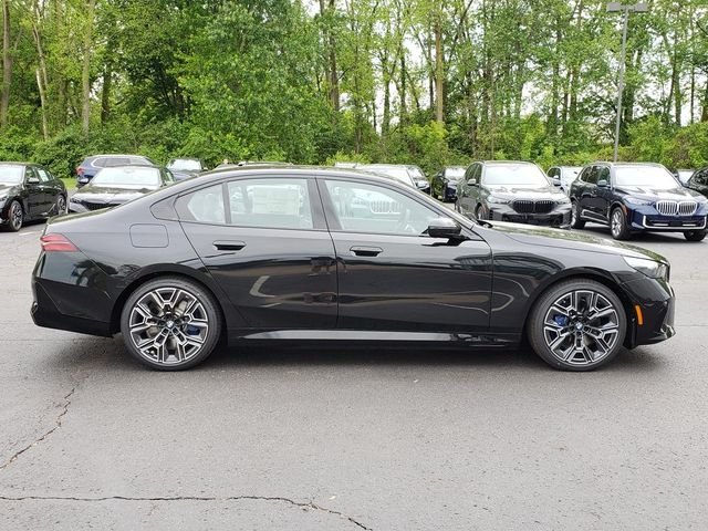 New 2027 Black Sapphire Metallic BMW 550e xDrive image 7