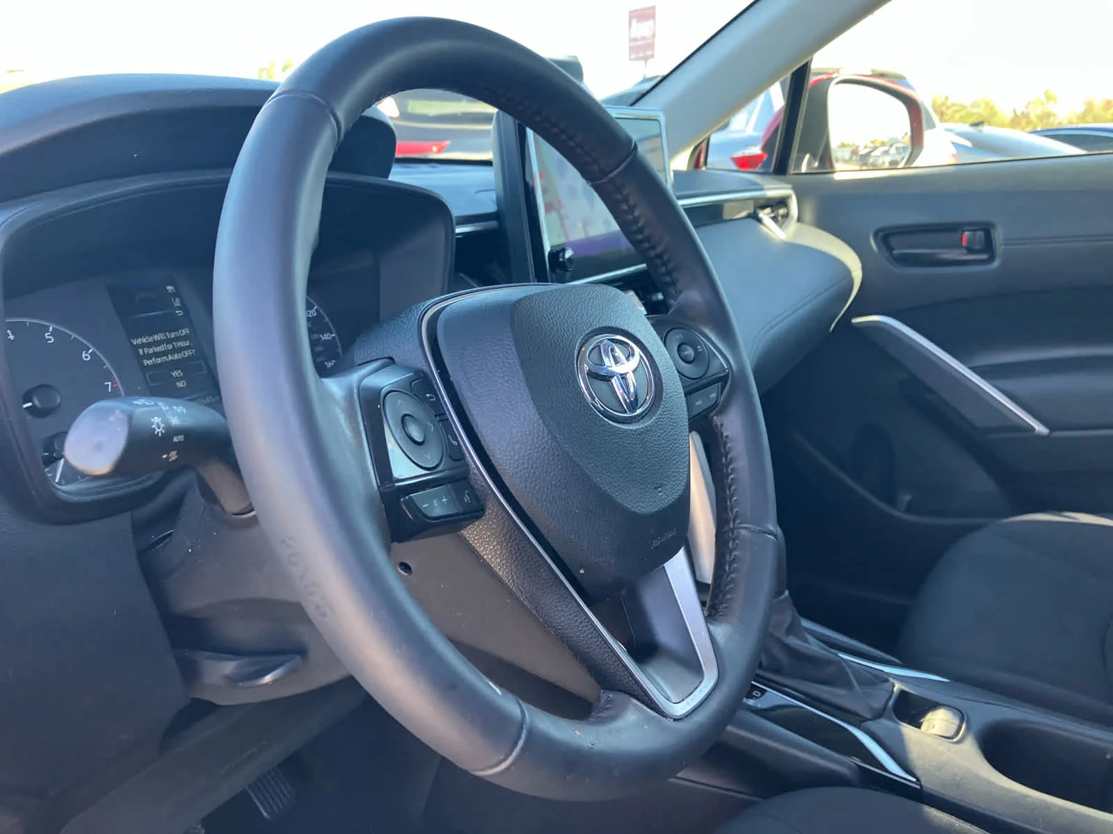 Used 2023 Barcelona Red Metallic Toyota LE image 9