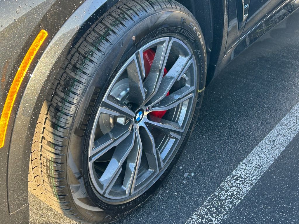 New 2026 Black Sapphire Metallic BMW xDrive50e image 3