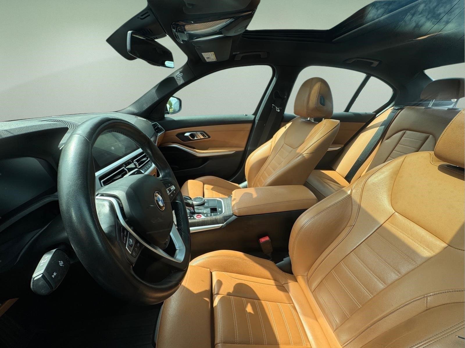 Used 2020 Black Sapphire Metallic BMW 330i image 4