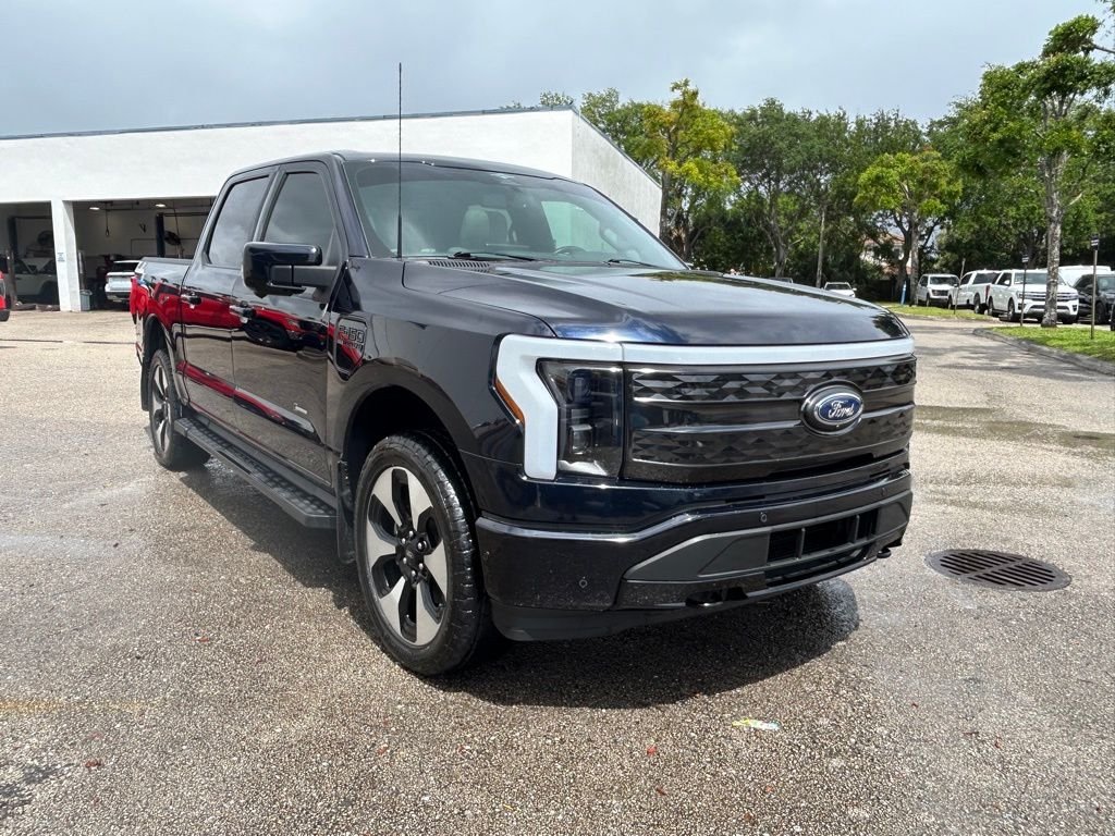 Certified 2023 Ford F-150 Lightning Platinum with VIN 1FT6W1EV7PWG05515 for sale in Lake Worth Beach, FL