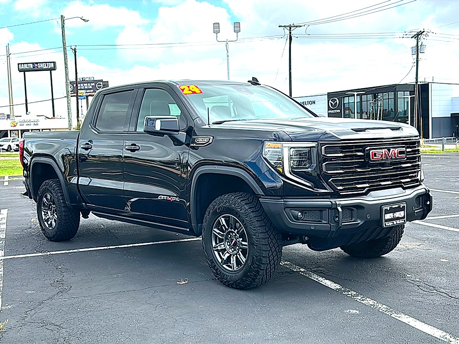 Used 2024 Onyx Black GMC AT4X image 10