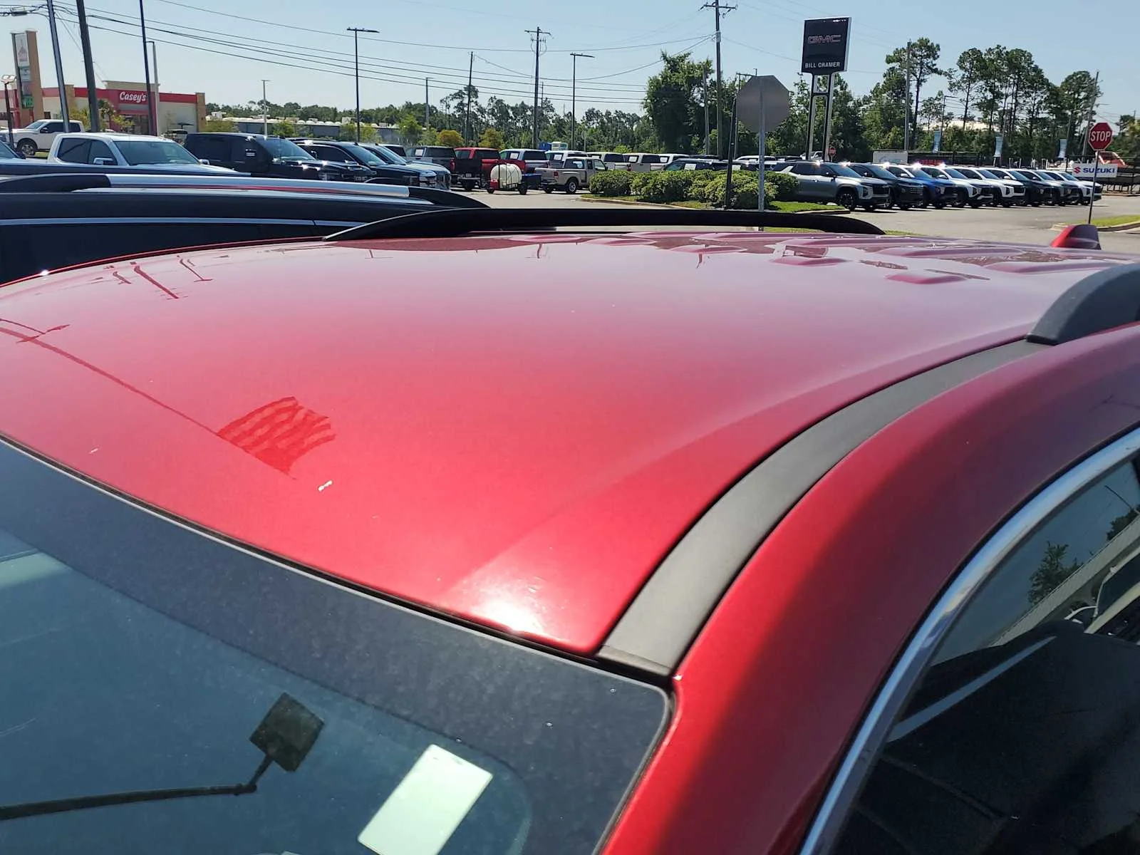 New 2025 Volcanic Red Tintcoat GMC Elevation image 19