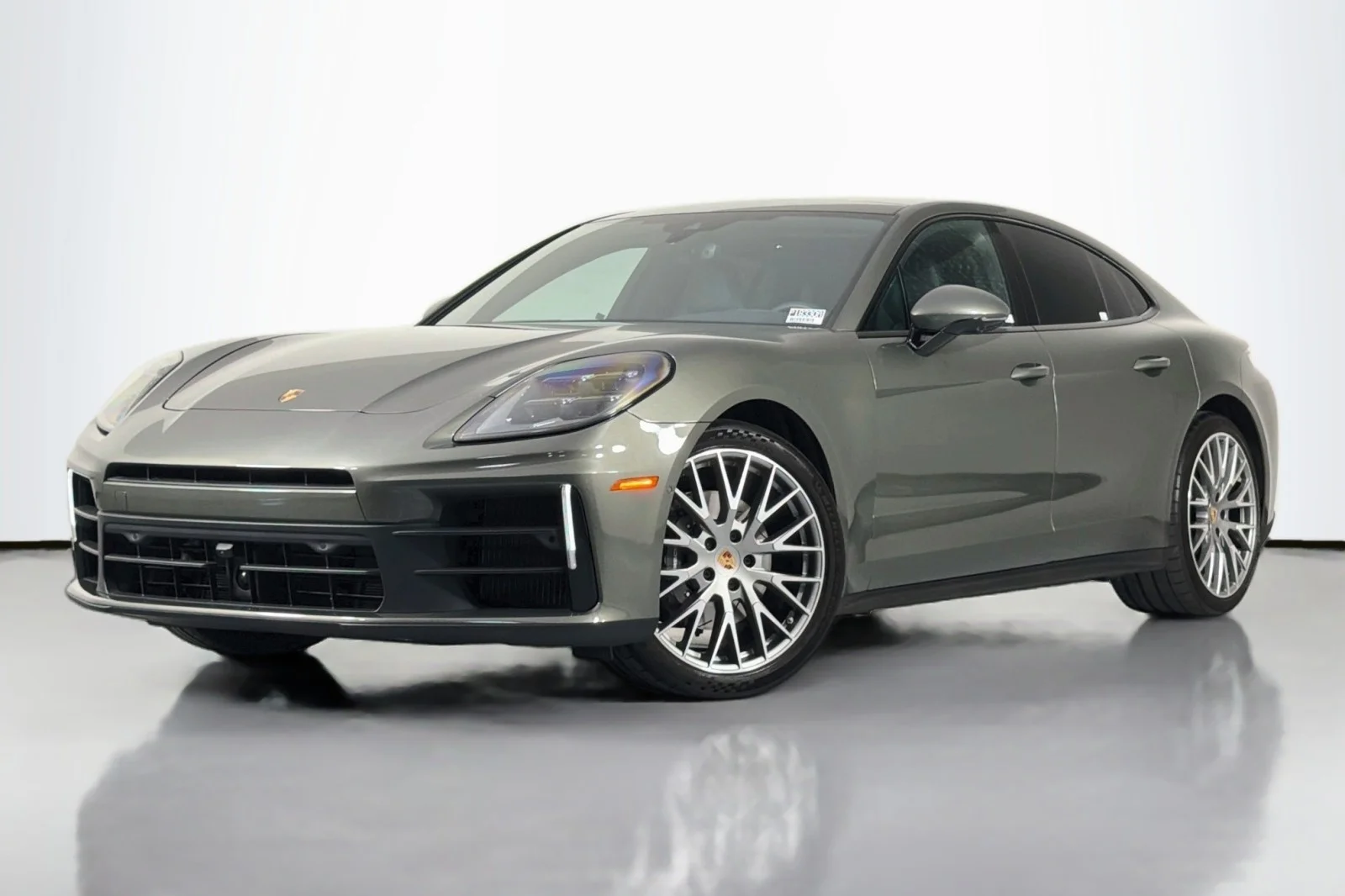 Used 2025 Aventurine Green Metallic Porsche  image 1