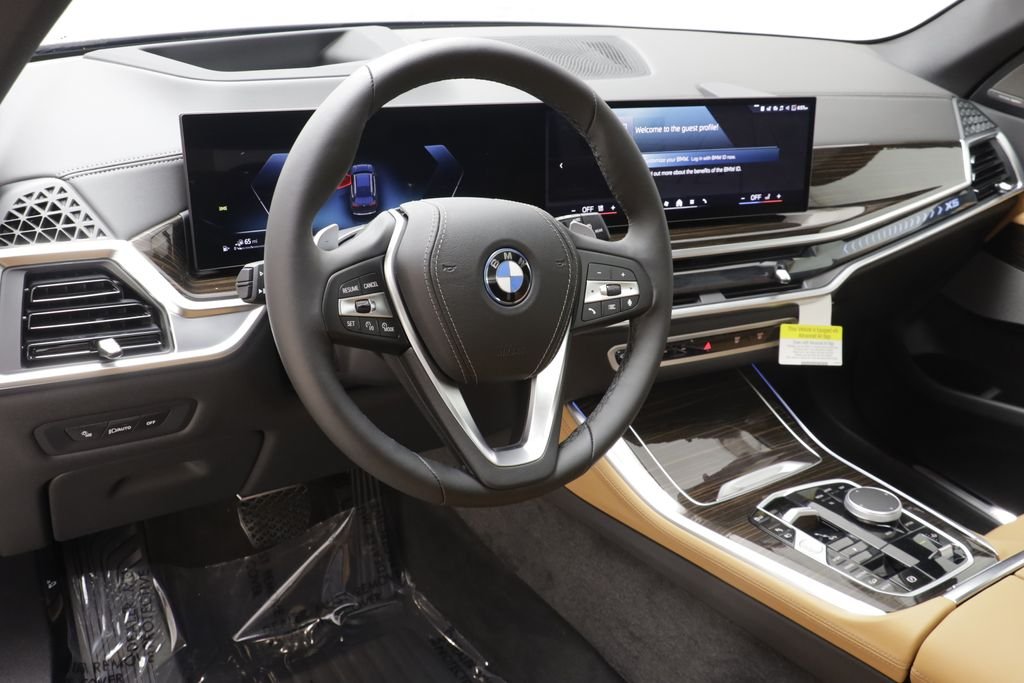 New 2026 Black Sapphire Metallic BMW xDrive50e image 8