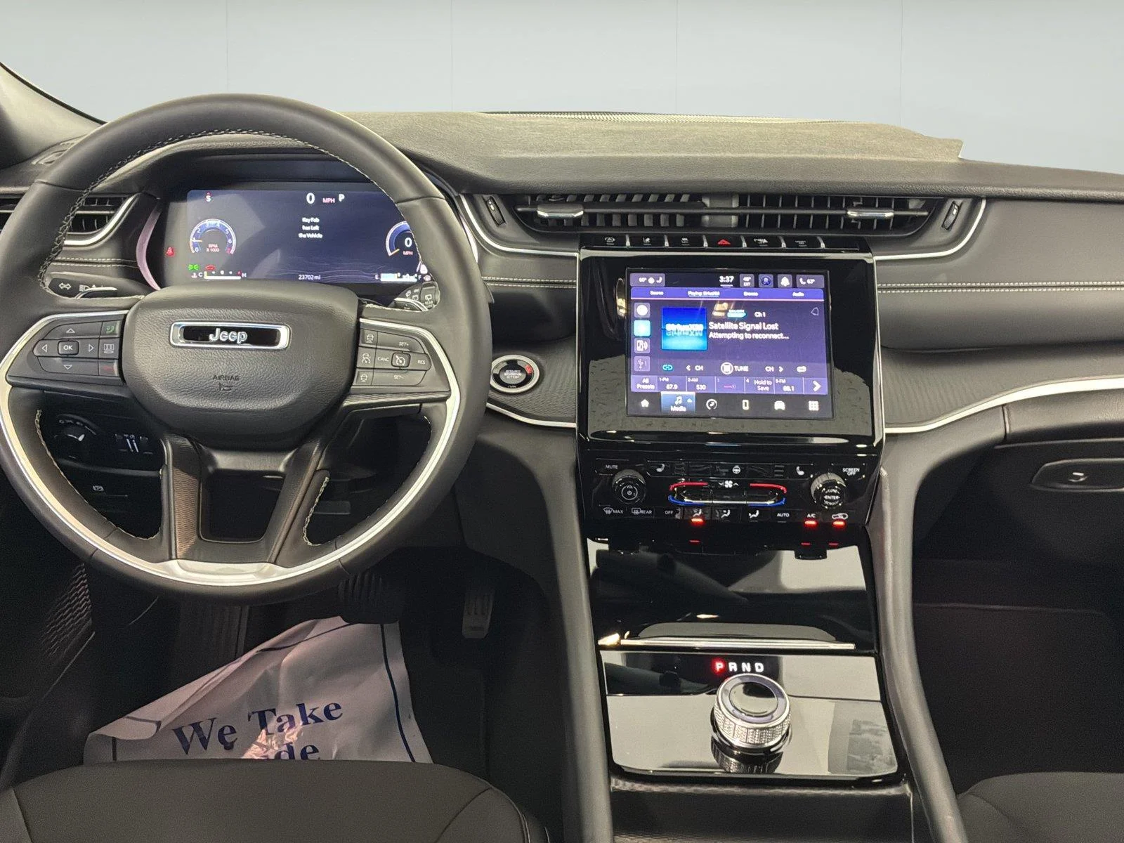 Used 2024 Silver Zynith Jeep Laredo X image 17