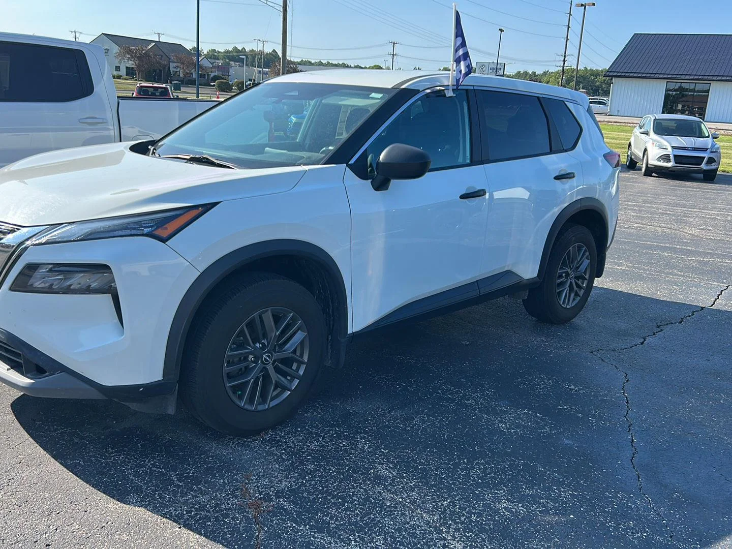 Used 2023 Glacier White Nissan S image 2