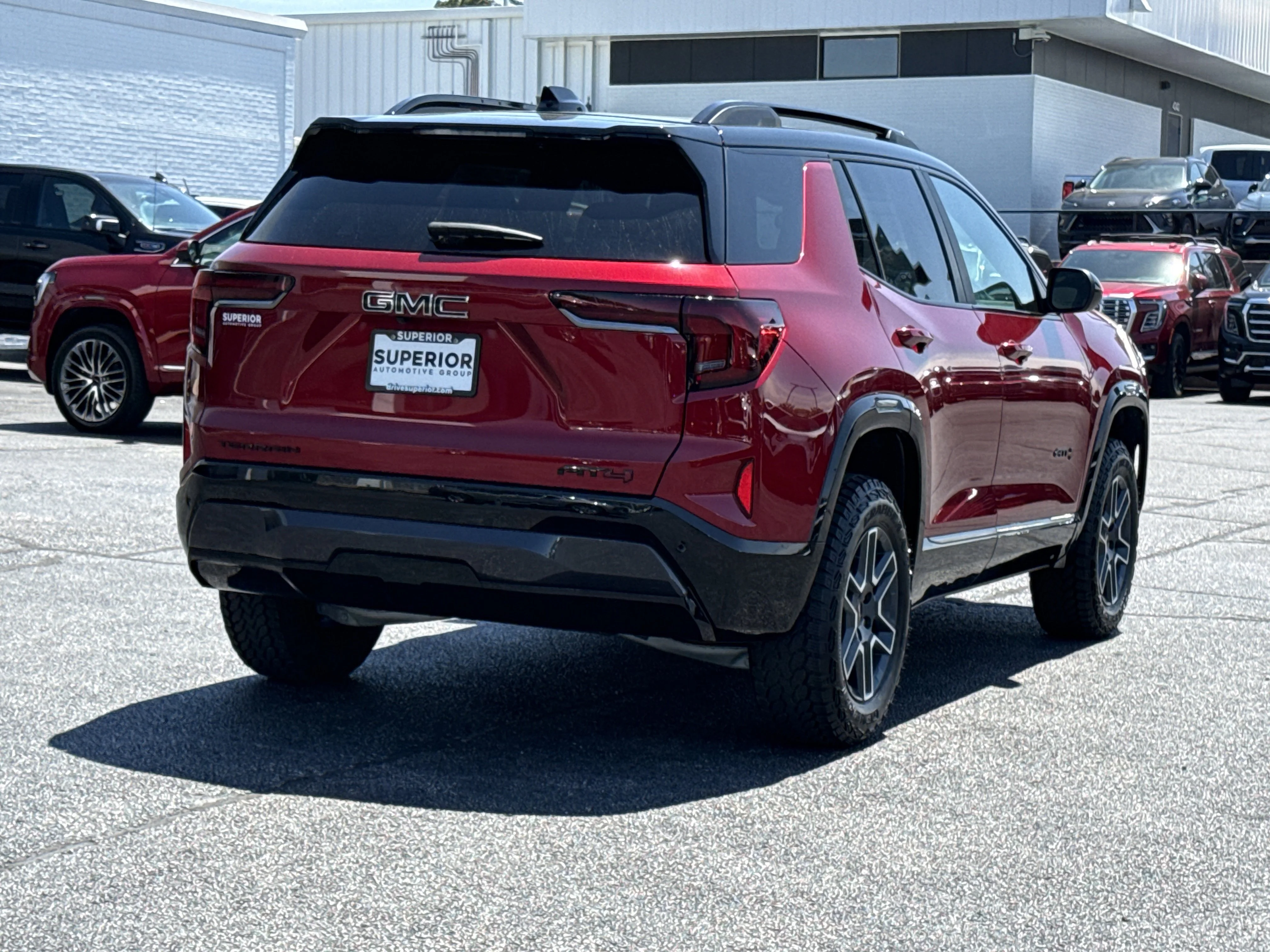 New 2026 Volcanic Red Tintcoat GMC AWD AT4 image 3