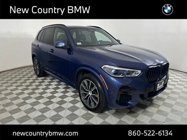 Used 2023 Phytonic Blue Metallic BMW M50i image 1