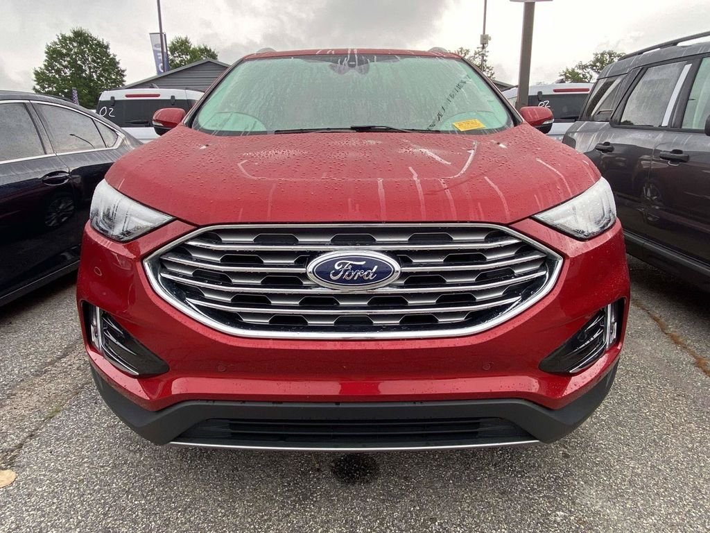 Certified Used 2023 Rapid Red Metallic Tinted Clearcoat Ford Titanium image 2
