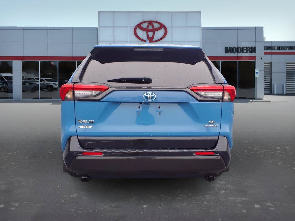 Used 2022 Cavalry Blue Toyota Hybrid SE image 4
