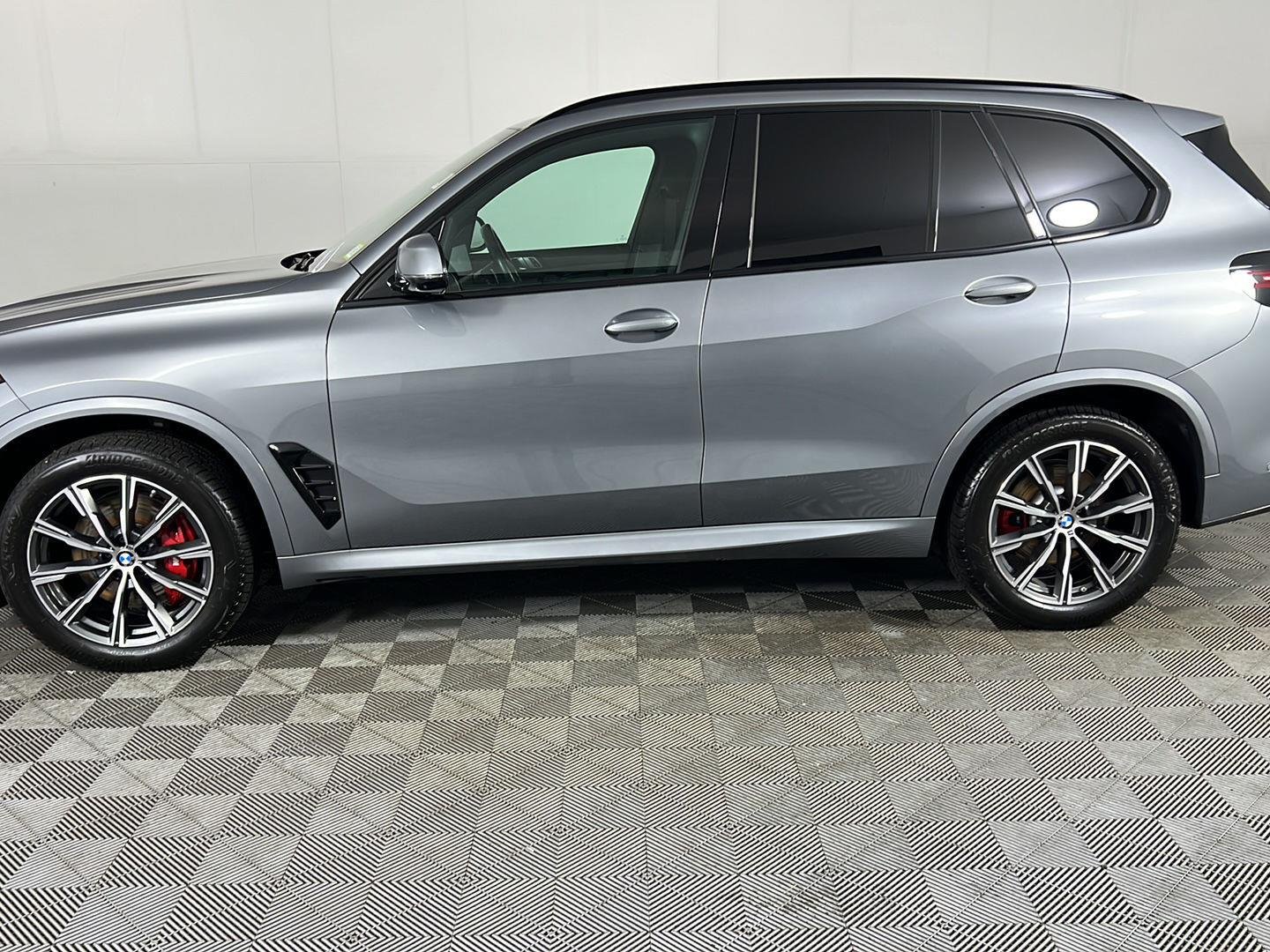 Certified Used 2024 Skyscraper Grey Metallic BMW xDrive40i image 12