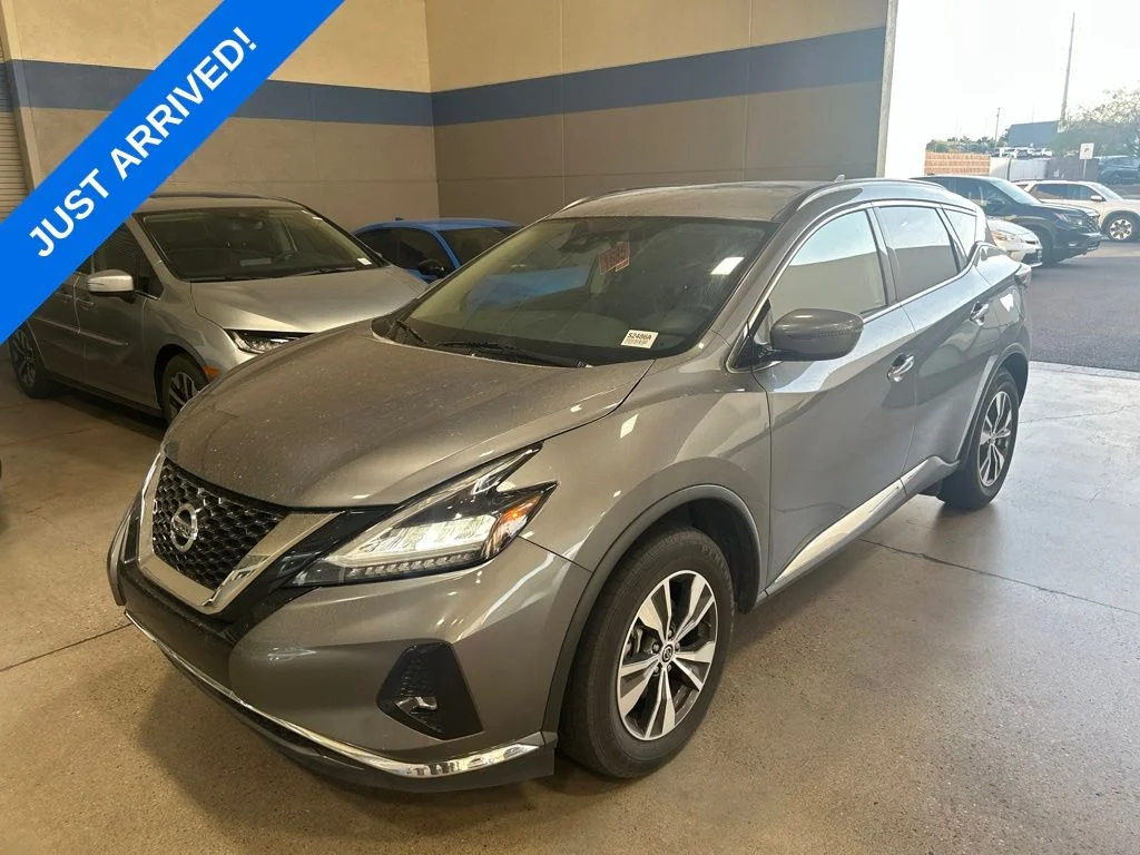 Used 2021 Gun Metallic Nissan SV image 1