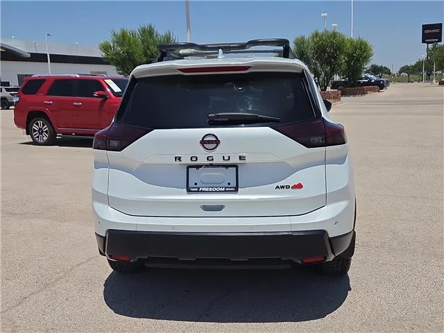 Used 2025 Everest White Pearl Nissan Rock Creek All-Wheel Drive image 3