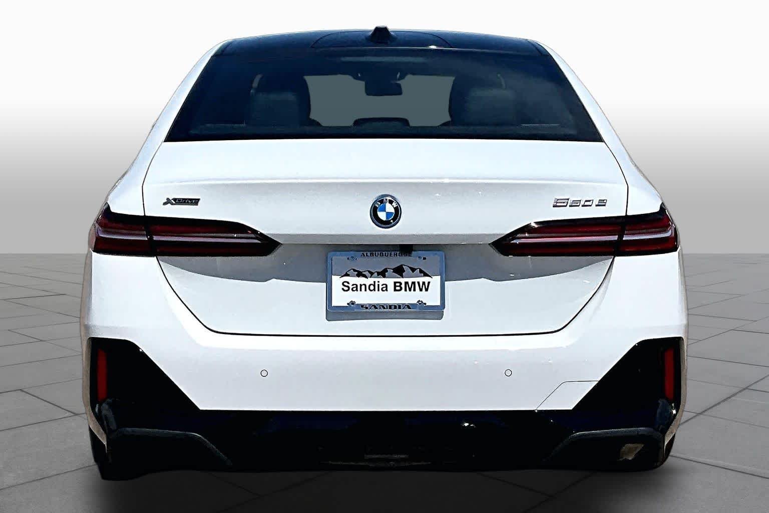 Used 2026 Alpine White BMW 550e xDrive image 4