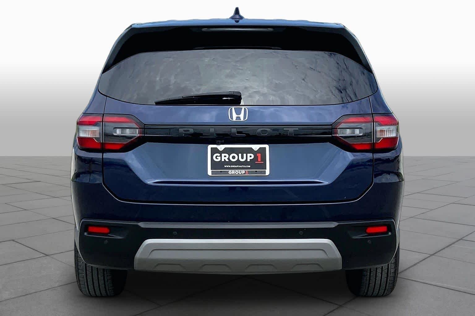 Used 2024 Obsidian Blue Pearl Honda EX-L 8 Passenger image 5