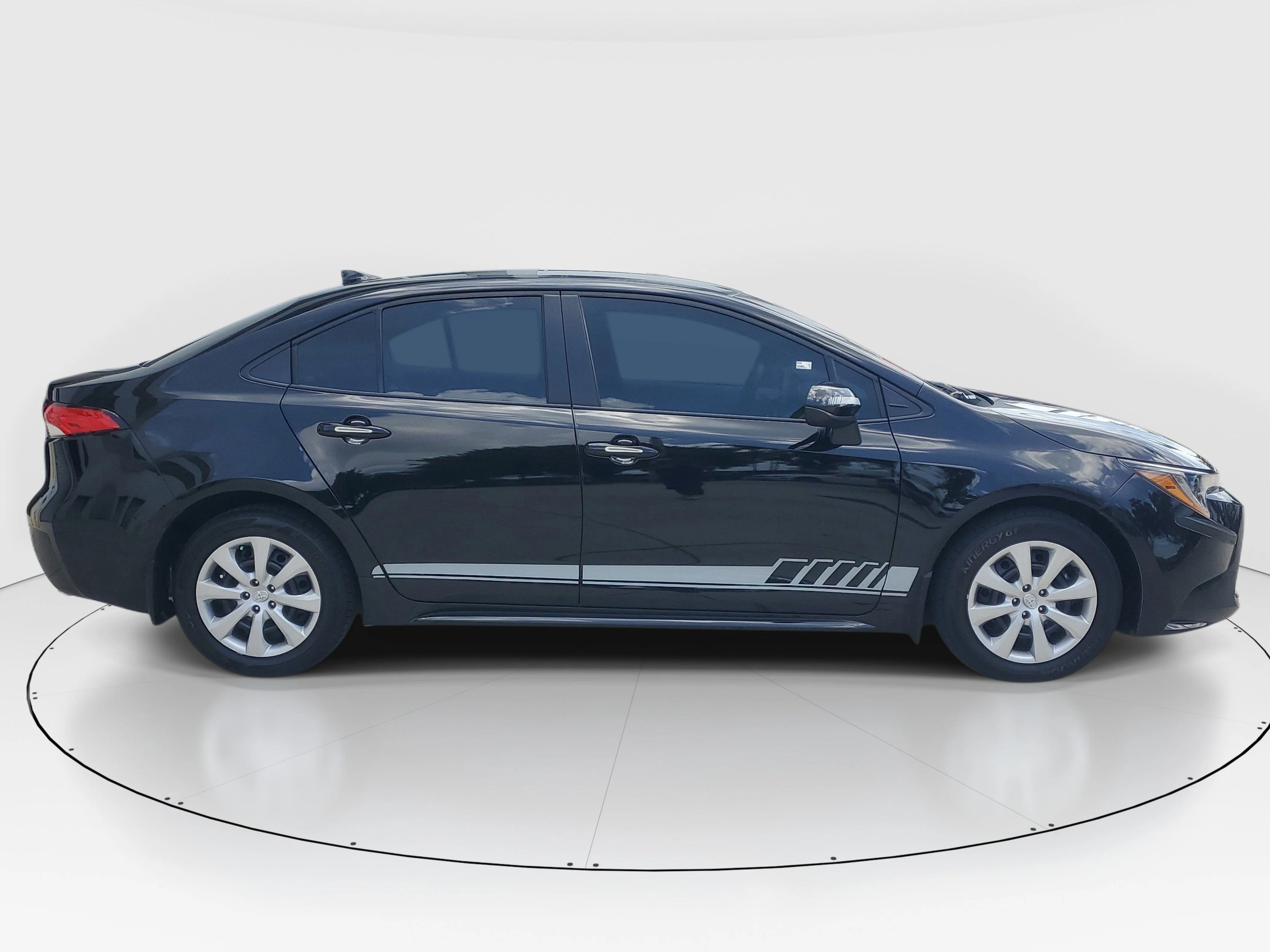 Used 2025 Midnight Black Metallic Toyota LE image 2