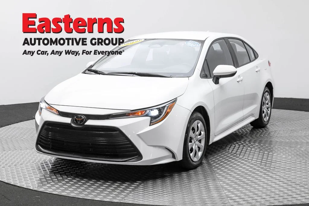 Used 2023 White Toyota LE image 1
