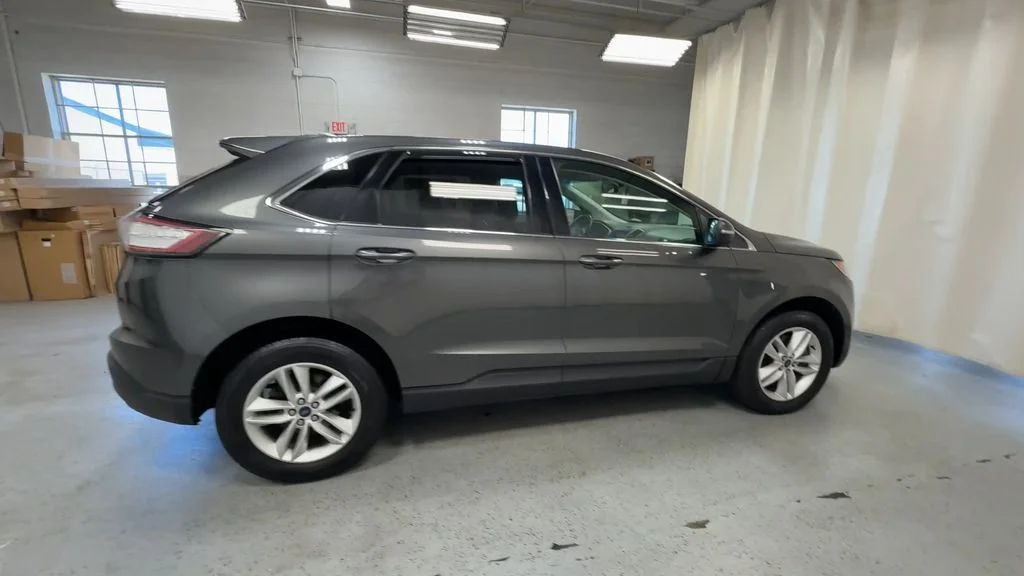 Used 2015 Magnetic Metallic Ford SEL image 11