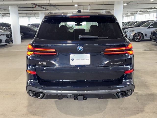 New 2026 Carbon Black Metallic BMW xDrive50e image 6