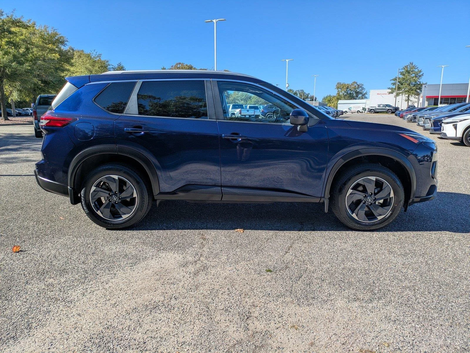 Used 2024 Deep Ocean Blue Pearl Nissan SV image 3