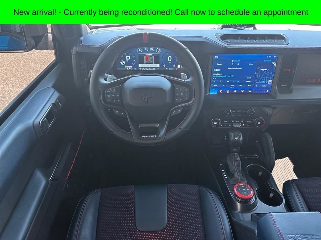 Used 2024 Blue Metallic Ford Raptor image 13