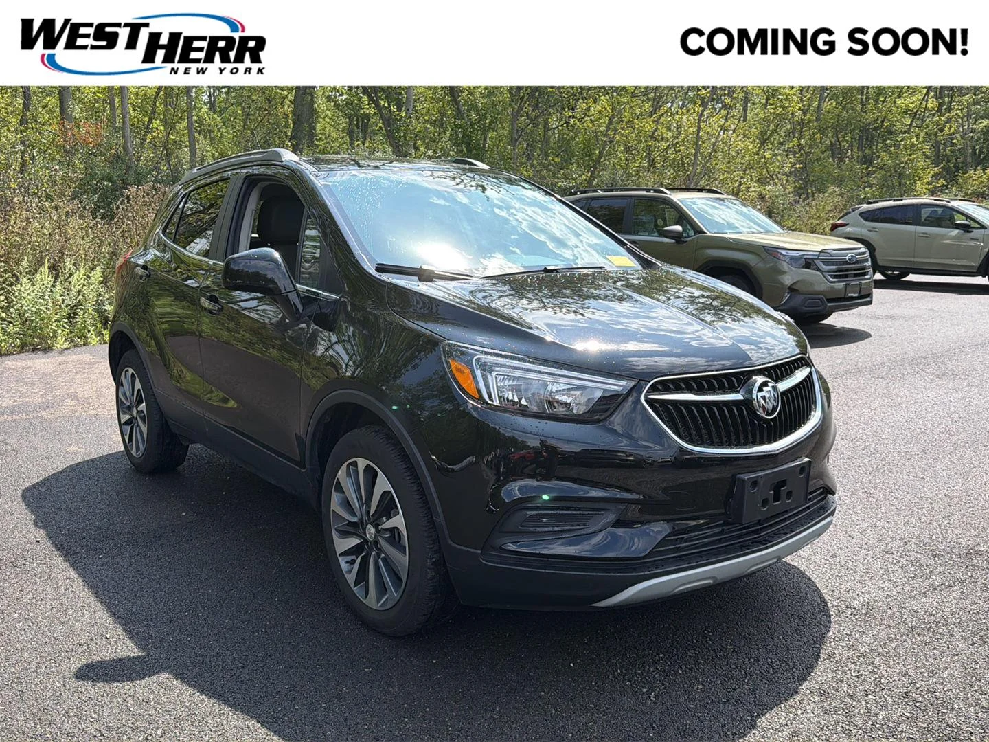 Used 2022 Ebony Twilight Metallic Buick Preferred image 1
