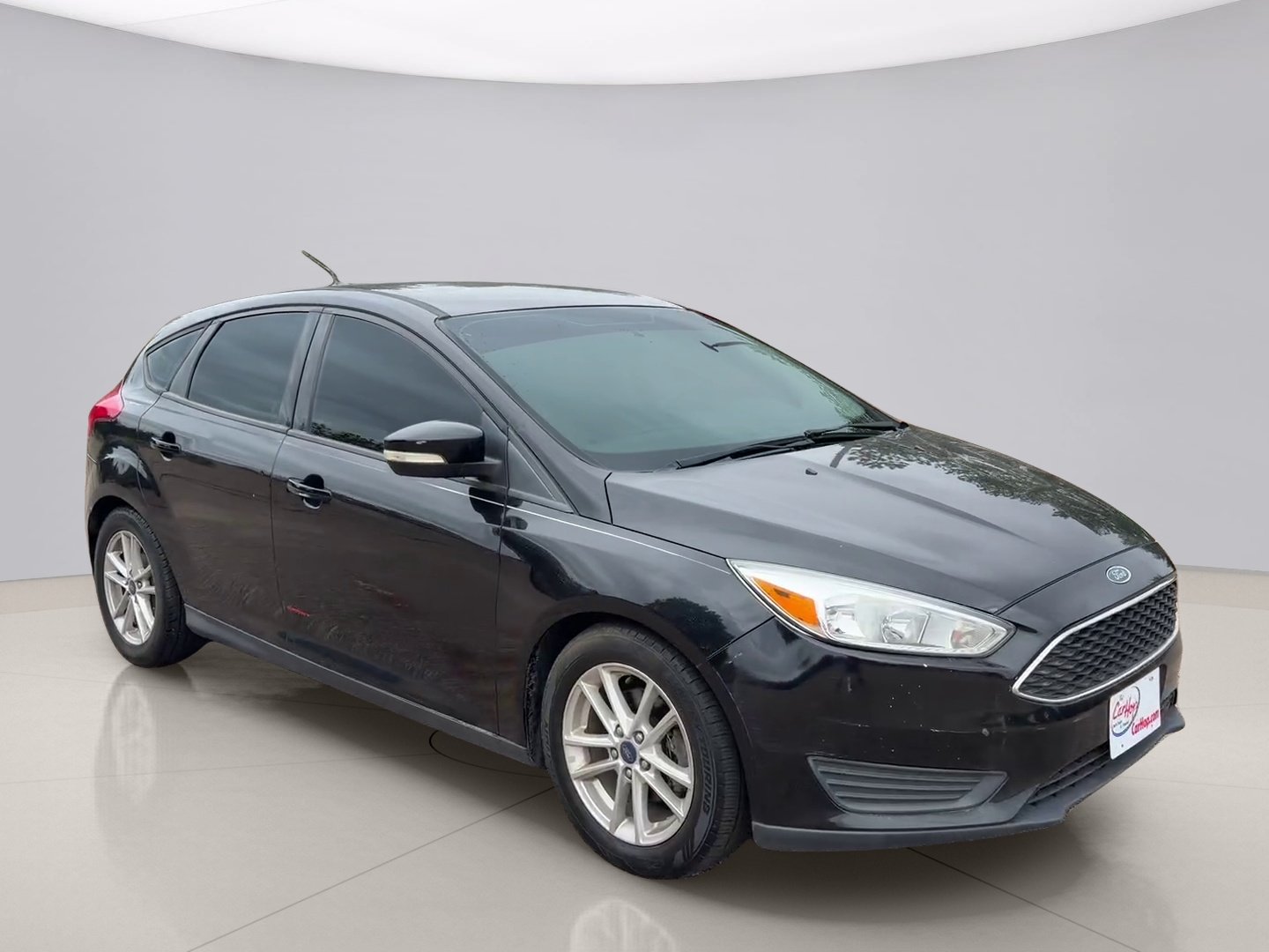 Used 2016 Black Ford SE HATCHBA image 7