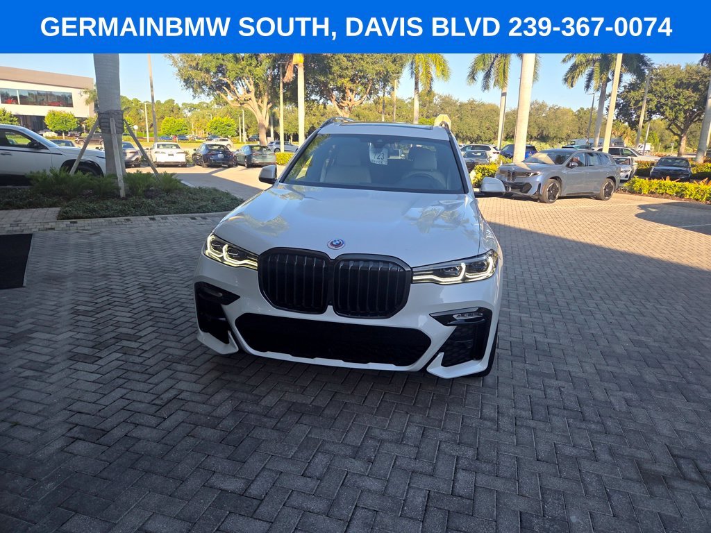 Used 2022 White Metallic BMW M50i image 1