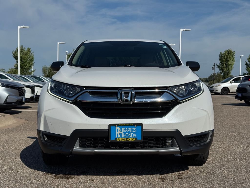 Used 2019 Honda CR-V LX with VIN 2HKRW6H39KH232691 for sale in Coon Rapids, Minnesota