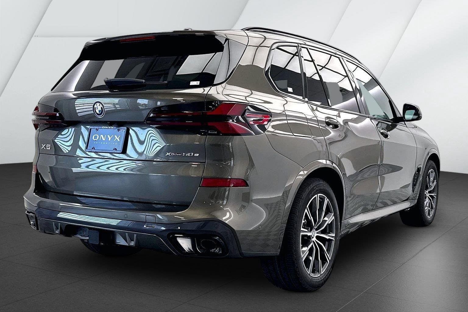 New 2026 Manhattan Green Metallic BMW xDrive50e image 6