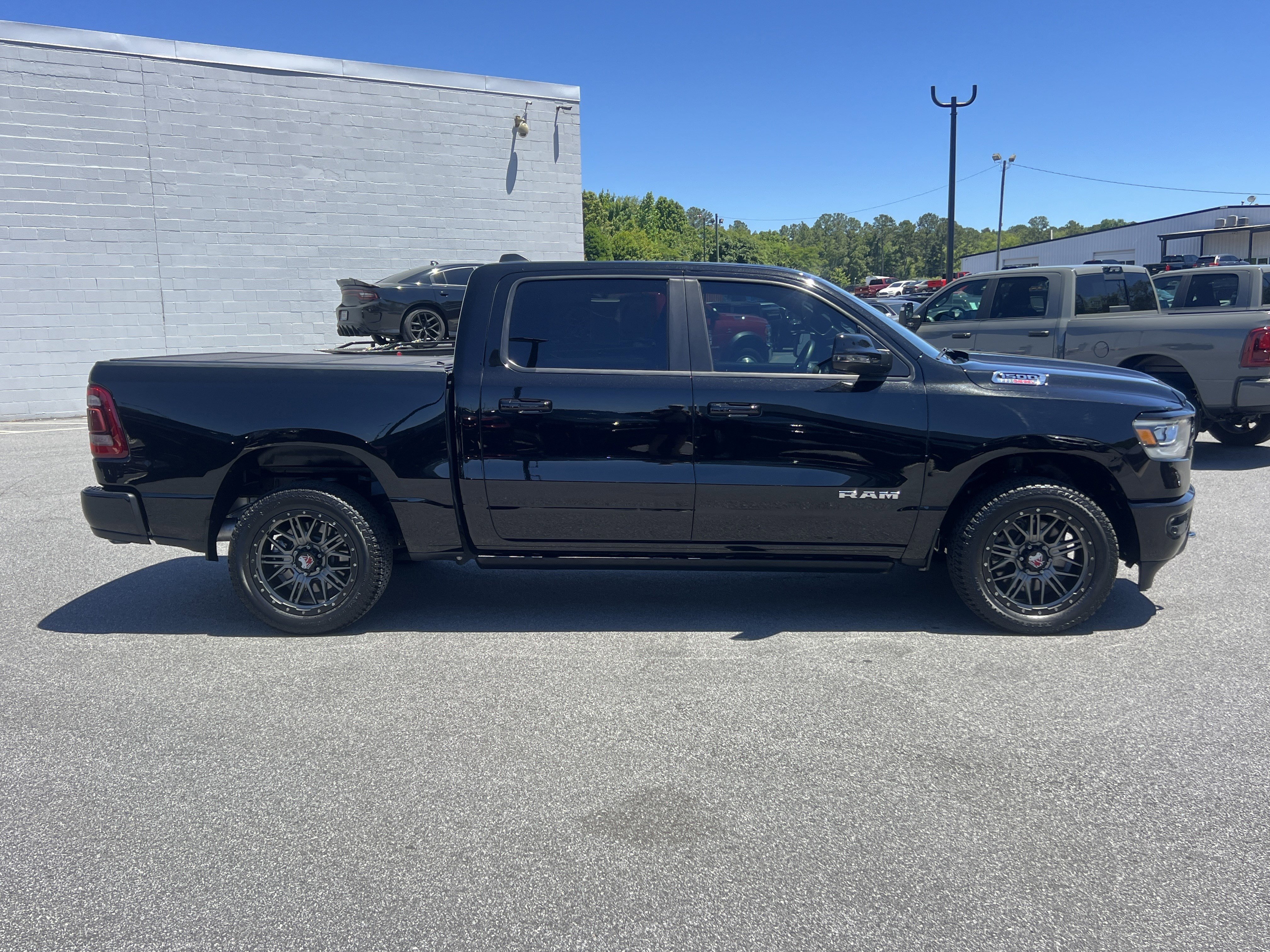 Used 2023 Diamond Black Crystal Pearlcoat Ram Laramie image 9