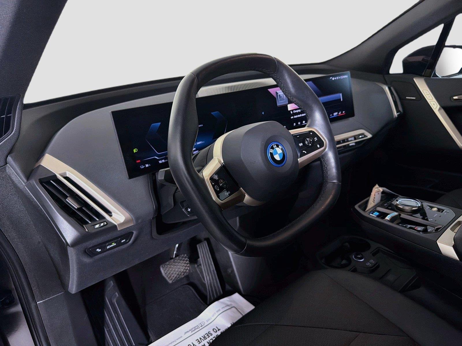 Used 2024 Black Sapphire Metallic BMW xDrive50 image 9
