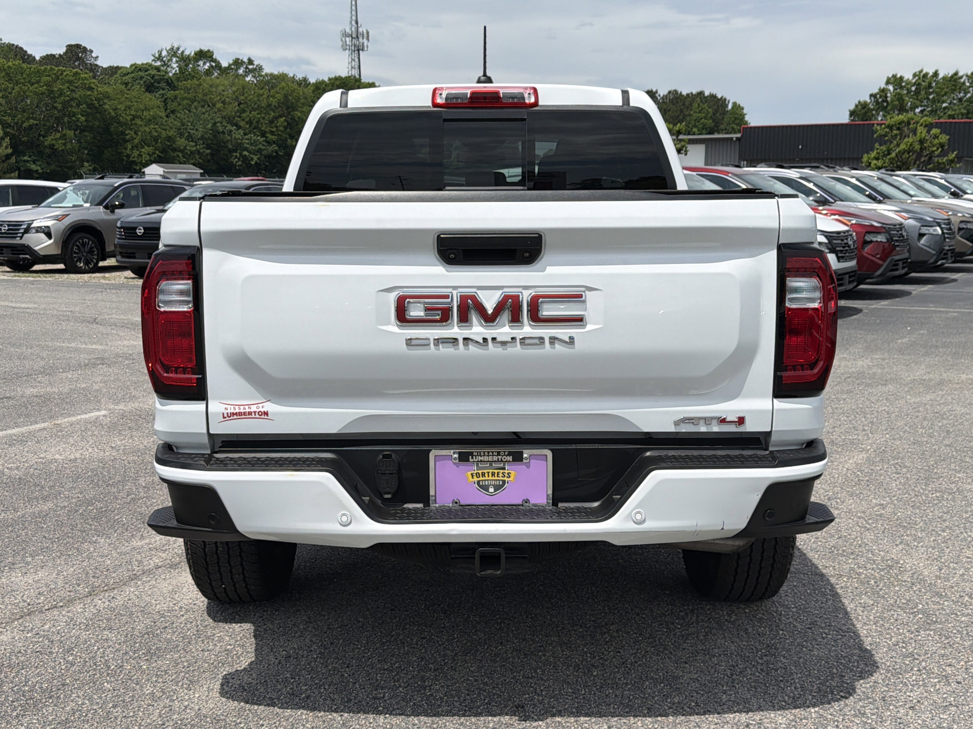 Used 2023 Summit White GMC 4WD AT4 image 28