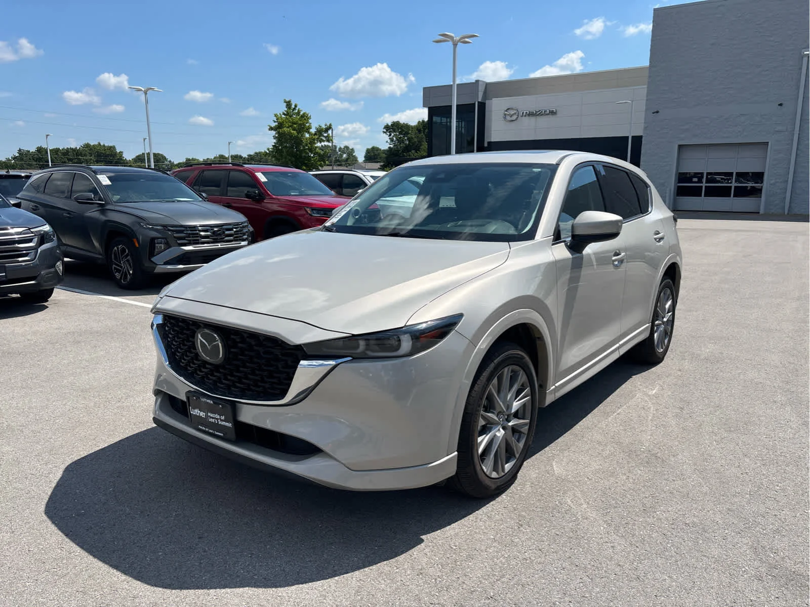 Used 2024 Mazda CX-5 S Premium Plus package with VIN JM3KFBEL9R0451888 for sale in Kansas City