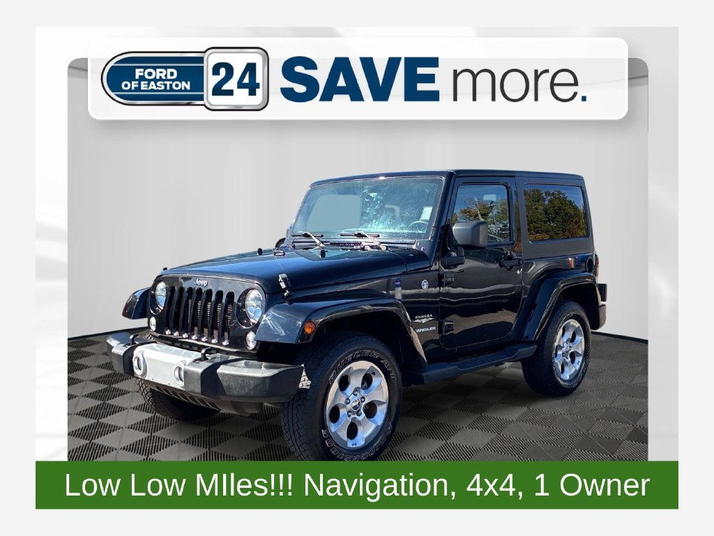 Used 2015 Black Jeep Sahara image 1