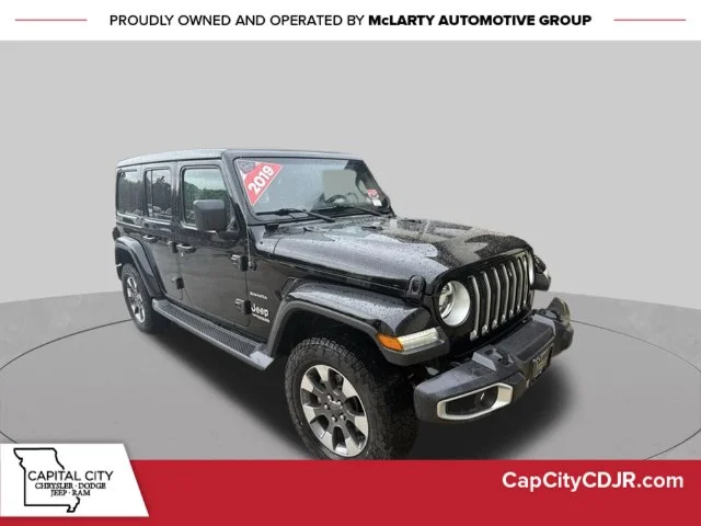 Used 2019 Black Jeep Unlimited Sahara image 1