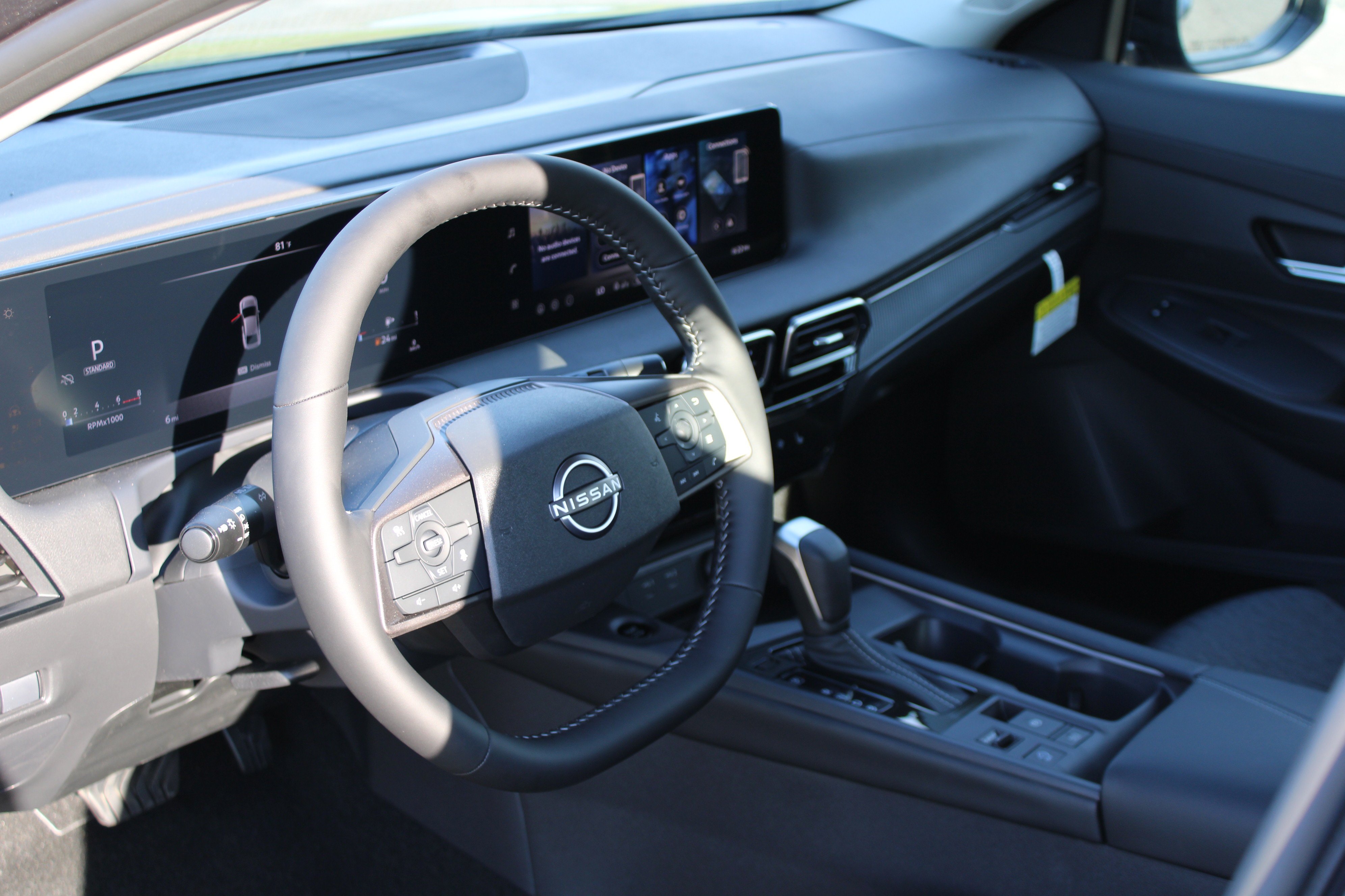 New 2026 Gun Metallic Nissan SV image 12