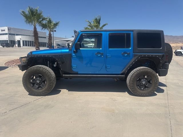 Used 2014 Jeep Wrangler Unlimited Sport with VIN 1C4BJWDG9EL186594 for sale in Lake Havasu City, AZ