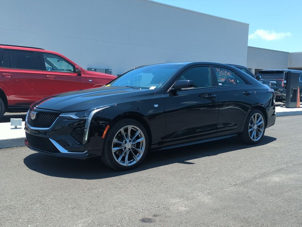 Used 2021 Black Cadillac Sport image 1