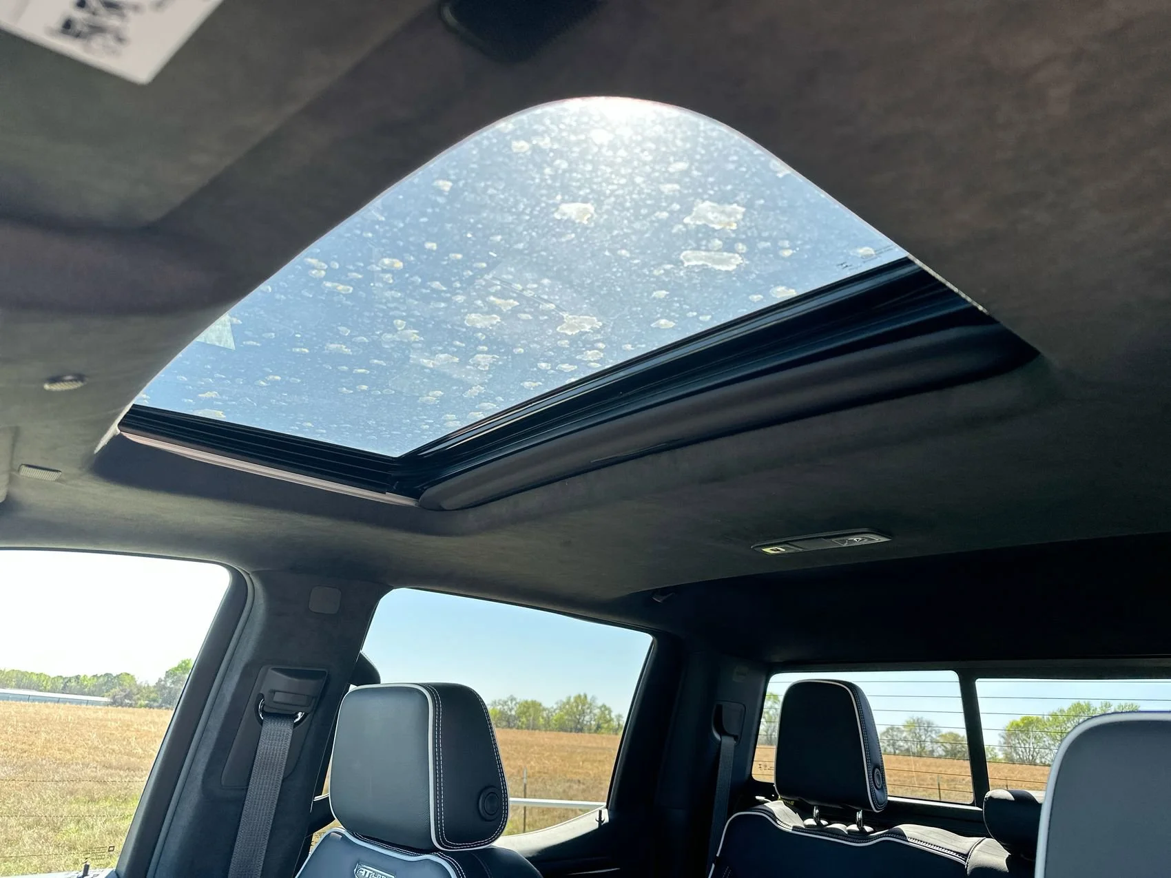 Used 2025 Sterling Metallic GMC AT4X image 22